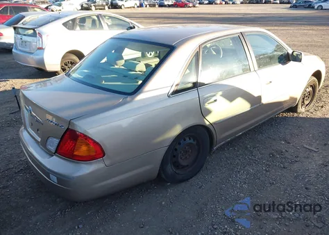 2000 Toyota Avalon Xl z USA, uszkodzony, nr VIN 4T1BF28B0YU112094